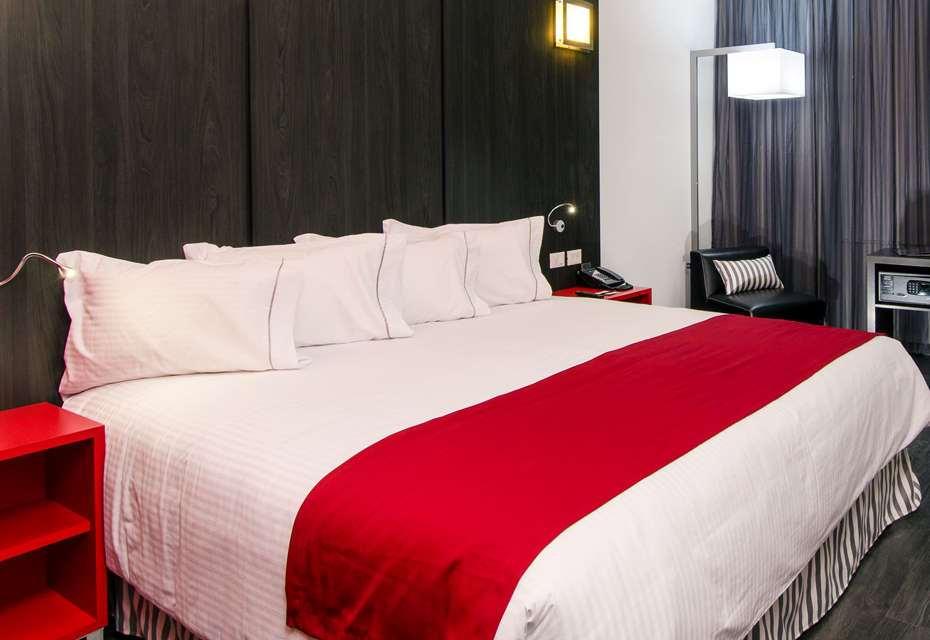 Ramada Encore By Wyndham Пуэбла Номер фото