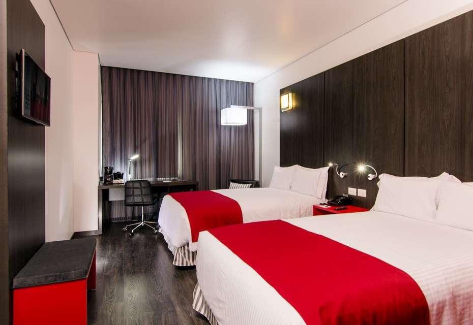 Ramada Encore By Wyndham Пуэбла Номер фото